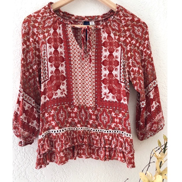 Francesca’s Burnt Orange and White Pattern Blouse - Picture 1 of 3